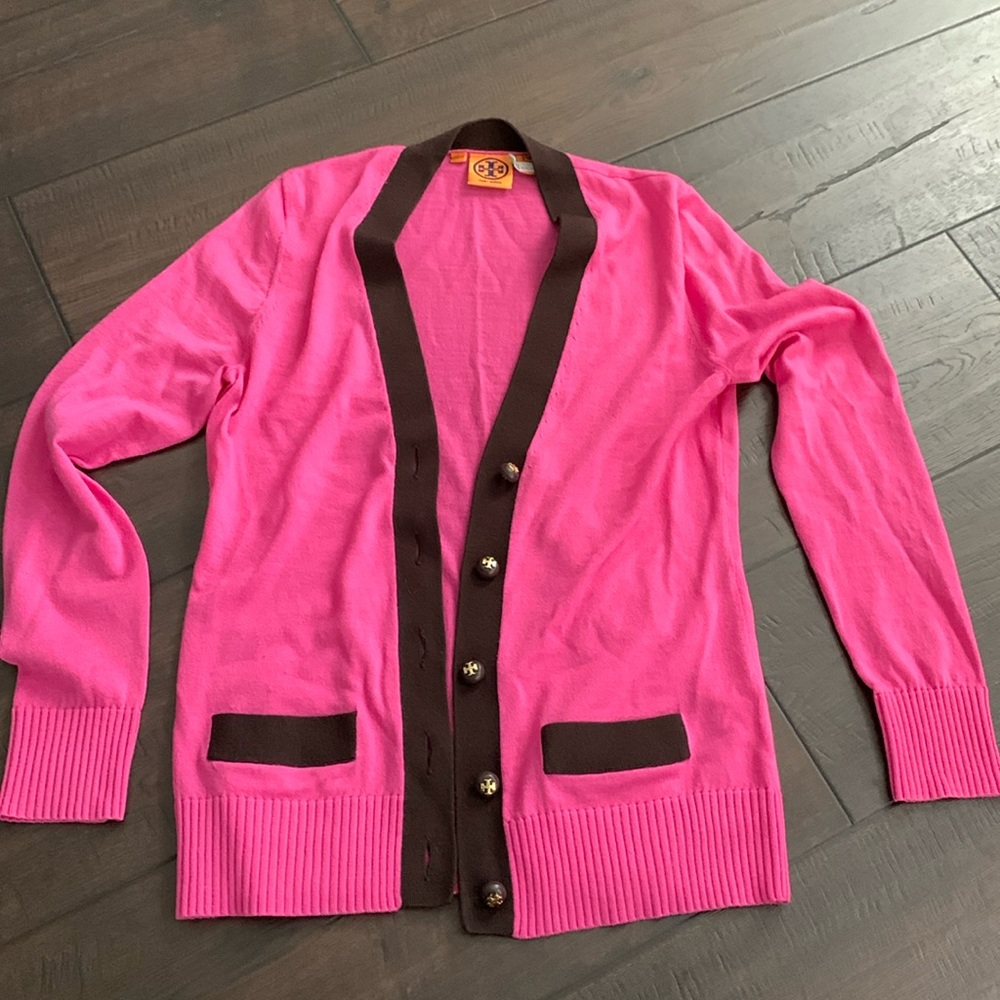 Tory Burch pink cardigan.